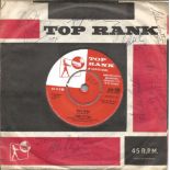 John Leyton and 6 others signed 45rpm Top Rank record sleeve of Wild Wind. Record included. Good