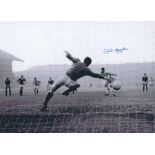 Football Autographed JOHN HUGHES photo, a superb image depicting Hughes scoring the winning goal