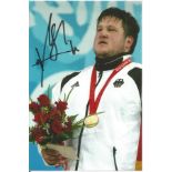 Olympics Matthias Steiner signed 6x4 colour photo of the gold medallist in weightlifting for Germany