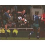 Tony Cottee 10x8 signed colour football photo pictured in action for West Ham United. Good