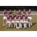 Football Autographed GEOFF HURST photo, a superb image depicting West Ham United players posing