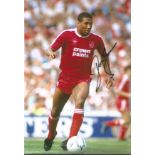 Football John Barnes 12x8 signed colour photo pictured in action for Liverpool. John Charles Bryan