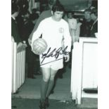 Johnny Giles 10x8 signed b/w football photo pictured leading Leeds United on to the pitch. Good