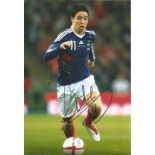 Samir Nasri 12x8 signed colour football photo pictured in action for France. Samir Nasri (born 26