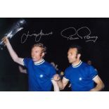 Football Autographed MICK JONES / PAUL REANEY photo, a superb image depicting both players