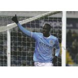 Football Yaya Toure 8x12 signed colour photo pictured in action for Manchester City. Good Condition.