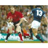 Rugby Union Gareth Thomas 8x10 signed colour photo pictured in action for Wales. Gareth Thomas