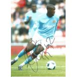 Football Yaya Toure 12x8 signed colour photo pictured in action for Manchester City. Good Condition.