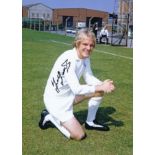 Football Autographed TERRY YORATH photo, a superb image depicting the Leeds United midfielder