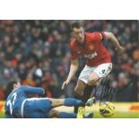 Football Phil Jones 8x12 signed colour photo pictured in action for Manchester United. Good