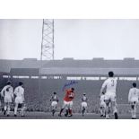 Football Autographed JOHN ASTON photo, a superb image depicting Aston celebrating with George Best