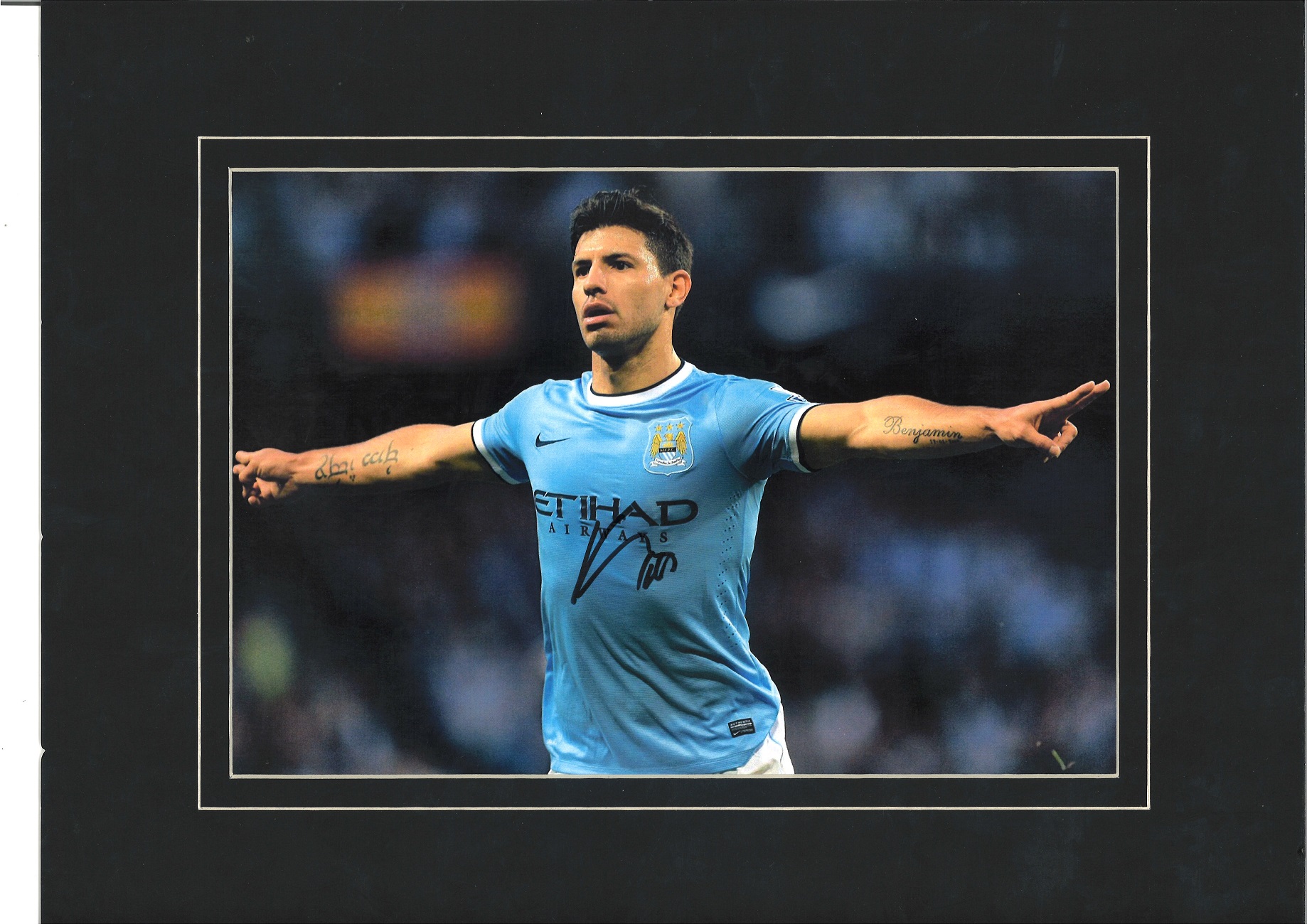 Sergio Aguero signed colour Man City photo. Mounted to approx size 16x12. Good Condition. All