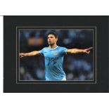 Sergio Aguero signed colour Man City photo. Mounted to approx size 16x12. Good Condition. All
