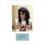 Alice Cooper signature piece mounted below colour photo of the singer. Signature obtained in 1994.