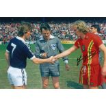 Football Autographed TERRY YORATH photo, a superb image depicting the Welsh captain shaking hands
