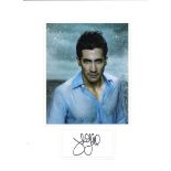 Jake Gyllenhaal signature piece mounted below colour photo. Approx overall size 16x12. Good