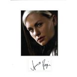 Anna Paquin signature piece mounted below colour photo. Approx overall size 15x12. Good Condition.