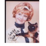 Hayley Mills Signature mounted with 10 x 8 inch picture. Professionally mounted to 16x12. Good