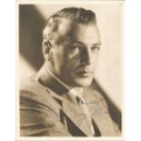 Gary Cooper authentic signed 9x7 black and white photo. Good Condition. All autographs are genuine