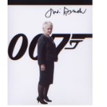 James Bond signed 10 x 8 inch sized picture of Dame Judi Dench in character. Good Condition. All