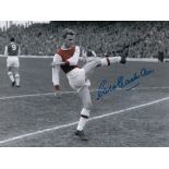 Football Autographed GEORGE EASTHAM photo, a superb image depicting the Arsenal inside-forward