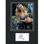 Mariah Carey signature piece mounted below colour photo. Approx overall size 16x12. Good