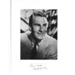 Randolph Scott signature piece mounted below b/w photo. American film actor whose career spanned