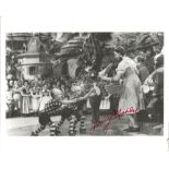 Jerry Maren signed 10x8 b/w photo as a Munchkin the Wizard of Oz. Good Condition. All autographs are