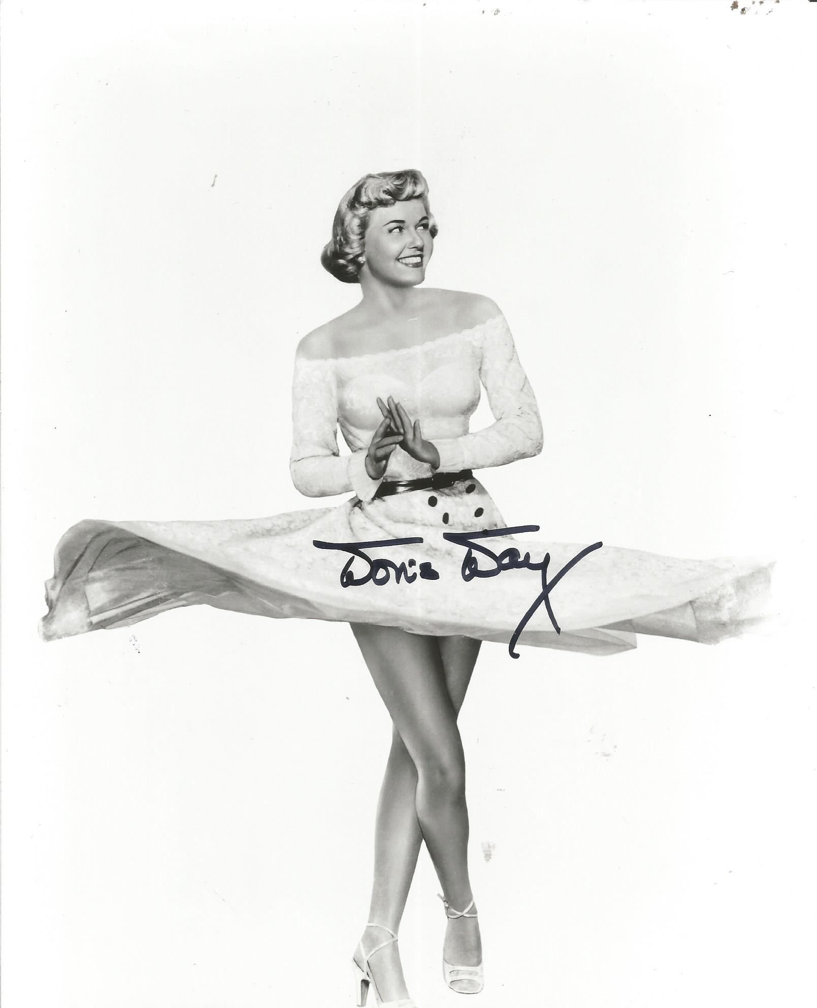 Doris Day signed 8x10 b/w photo. American actress, singer, and animal welfare activist. Day became