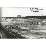 F/Lt Dick Starkey signed 12x8 b/w photo of a wartime image of the North Compound at Stalag Luft III.