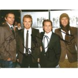Take That signed 6x8 colour photo. Signatures include Gary Barlow, Mark Owen, Howard Donald and