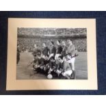 Football Manchester United legends signed 16x20 mounted black and white team photo signed by Nobby