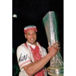 Football Autographed Bryan Roy Photo, A Superb Image Depicting Roy Posing With The UEFA Cup During