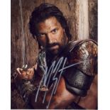 Manu Bennett Spartacus hand signed 10x8 photo. This beautiful hand signed photo depicts Manu Bennett