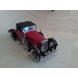 Stutz Franklin mint 1/24 scale model of a 1928 Stutz Blackhawk Boattail Speedster Red/Black, in