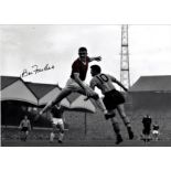 Football Bill Foulkes 12x16 signed colour enhanced photo pictured in action for Manchester United.