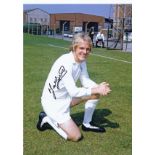 Football Autographed 16 X 12 Terry Yorath Photo, A Superb Image Depicting Yorath Striking A Full