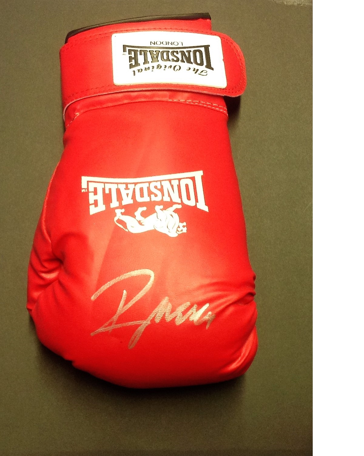 Lonsdale boxing glove signed by former heavyweight champion Ray Mercer. Raymond Anthony Mercer is