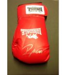 Lonsdale boxing glove signed by former heavyweight champion Ray Mercer. Raymond Anthony Mercer is
