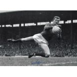 Football Alex Stepney 12x16 signed black and white photo pictured in action for Manchester United.