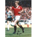 Football Brian Greenhoff 12x8 signed colour photo pictured in action for Manchester United in the