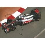 Motor Racing Jenson Button 12x8 signed colour photo pictured driving for McLaren Mercedes in 2011.