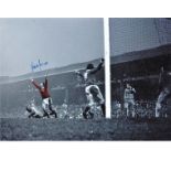 Football Lou Macari 12x16 signed colour enhanced photo pictured in action for Manchester United.