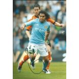 Football Carlos Tevez 12x8 signed colour photo pictured in action for Manchester City. Good