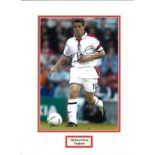 Football Michael Owen signed 16x12 mounted colour photo pictured in action for England. Michael