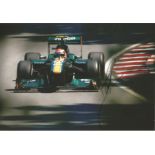 Motor Racing Jarno Trulli 12x8 signed colour photo pictured driving for Lotus Renault in 2011.