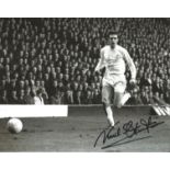 Football Norman Hunter 8x10 signed black and white photo pictured in action for Leeds United. Good