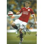 Football Ole Gunnar Solskjær 12x8 signed colour photo pictured in action for Manchester United. Good