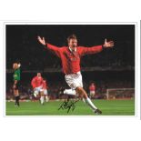 Football Teddy Sheringham 12x16 signed colour photo pictured celebrating scoring for Manchester