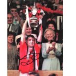 Football Steve Bruce 16x12 signed colour photo pictured lifting the FA Cup while captain of